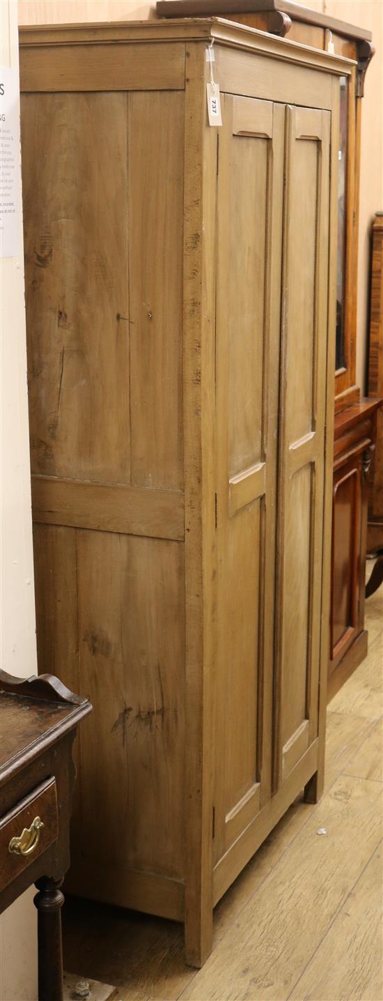A pine two door cupboard W.86cm